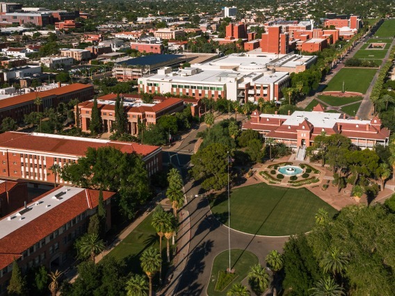 an aerial view of old main and the university of arizona campus
