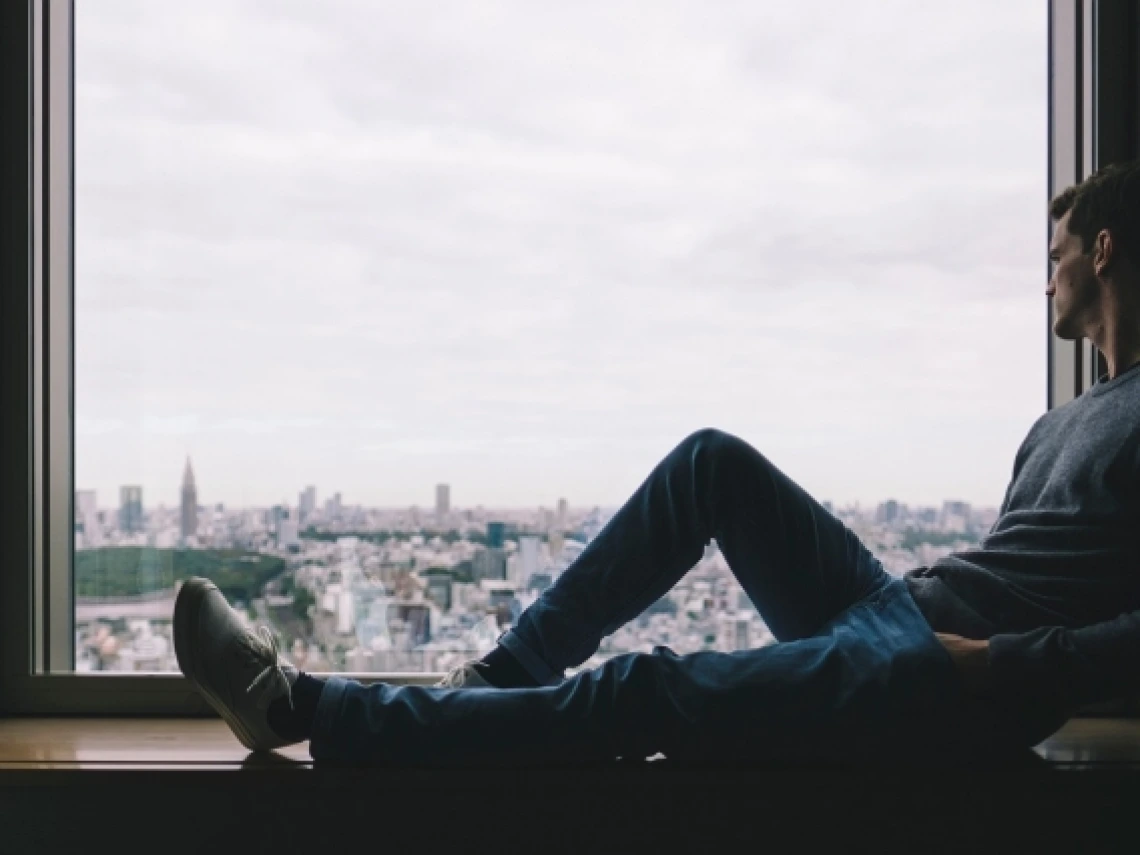 A person sitting alone.